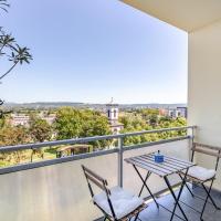 RM Studio balcony with outdoor seating and a view